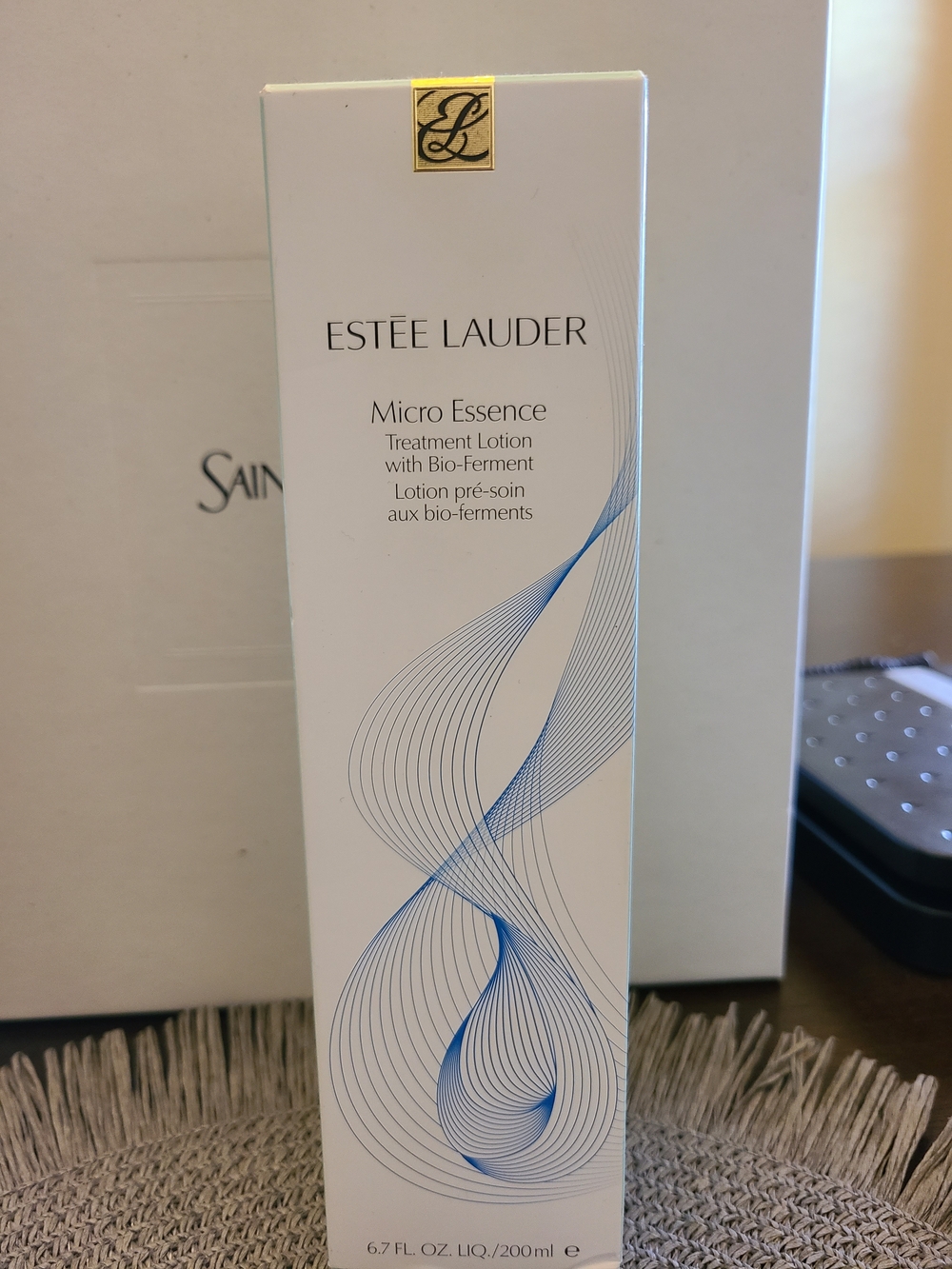 Estée Lauder Micro Essence Treatment Lotion - White with Blue Accents